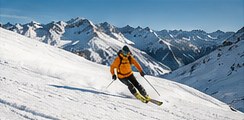 Skier on a snowy slope